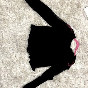 Ruffled lace and black long sleeve blouse